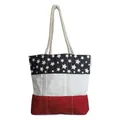 Detailed view of canvas tote bag with American flag stars and stripes pattern and rope handles - Red & Black