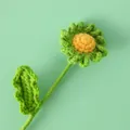 Handmade crochet daisy flower with green petals and orange center for creative home decor - Green