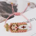 Handmade woven Miyuki bead bracelet with Virgin Mary figure and adjustable pink cord - Pink