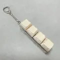 Stress relief fidget keychain with four cream keycaps on a transparent base and metal chain - No Light (Snake Bone Chain) / 4-Key Transparent Shell Beige