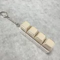 Mechanical keyboard keycap keychain with 4 white backlit keys and silver metal chain - 4-Key White Shell Beige