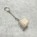 Mechanical fidget keychain with light pink keycap and durable metal spring clip - 1-Key Transparent Shell Beige