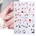 Cow print nail stickers in black, brown and red patterns for trendy manicure art - Three Color Cow Spot Texture (STZ-CS69)