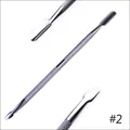 Macro detail of dual-end stainless steel nail cuticle pusher with anti-slip textured handle - Steel Pusher Style 2