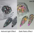 Holographic silver hexagonal nail glitter in jar showing natural and flashy light effect - AA-10