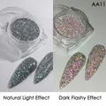 Holographic nail glitter AA11 showing natural light and dark flashy diamond effects - Diamond Reflective Powder Aa-11