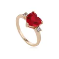 Elegant gold-plated ring featuring a red heart-shaped gemstone with diamond accents - Red And Gold
