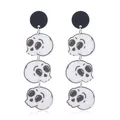 Gothische wit-zwarte acryl oorbellen met drie schedels voor Halloween kostuums - Drievoudige Schedel Stijl