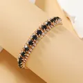 Luxe boheems gouden legering armband met zwart kristal en kleine heldere steentjes - Zwart (KC Goudtint)