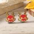 Cartoon style wooden reindeer stud earrings in red and gold finish on autumn wood background - Red Gold Cartoon Deer Style (WEH4272) / Red