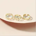 Detalle de tres anillos dorados para el pie con corazones y estrellas, diámetro de 1,5 cm - Estilo Corazón Estrella Hueco Dorado (WJR001)