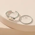Juego de dos anillos plateados para los pies con motivo de elefante y banda sencilla, 1,4 cm de diámetro - Estilo Banda Lisa Elefante Vintage (WJR004)