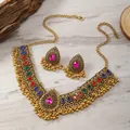 Ethnic gold jewelry set with colorful gemstones and tassel details on wooden background - Multicolor Gemstone Teardrop Design (WTZ240) / Colorful Antique Gold