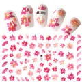 Detail view of 3D cherry blossom nail stickers in pink and red with model F091 - F091 (nude Film)