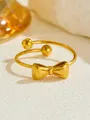 Detailed close-up of a rose gold open ring featuring a bow knot and spherical ends - Bowknot Open Ring (D010) / Gold