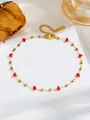 Detail van gouden titanium stalen ketting met rode kristallen harten en S.Steel-tag - Rode Hart Enkelband (J814) / Goud
