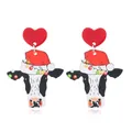 Close-up of festive acrylic drop earrings with cute cow wearing a Christmas hat - Christmas Lights Cow Style (WEH5668)