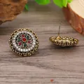 Macro shot of vintage alloy earrings with colorful rhinestones and ornate metalwork - Round Ethnic Rhinestone Stud Style (EH2814)