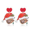 Detail of Christmas highland cow acrylic earrings with red heart studs and festive hat - Highland Cow with Candy Cane Style (WEH5672)