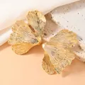 Elegant gold ginkgo leaf stud earrings with detailed metallic texture and vein pattern - Ginkgo Leaf Shape (WEH5030) / Gold