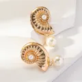 Elegant gold nautilus bow earrings featuring vintage seashells and hanging cream pearls - Conch Pendant Gold