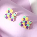 Detail of cute acrylic dog stud earrings with colorful polka dots on purple surface - Colorful Polka Dot Dog Silhouette Style (WEH4581)