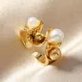 Detail of gold open ring featuring white pearls and a textured metal ball on satin - Gold Double Bead Open Style (M1023)