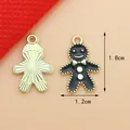 Christmas Gingerbread Man DIY charms in gold and black enamel finish, 1.8cm x 1.2cm size - Black Gingerbread Man (1.2cm x 1.8cm)