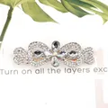 Elegant silver hair clip featuring sparkling white rhinestones and crystal flower pattern - Cross Knot White