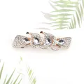 Elegant gold flower hair clip with sparkling rhinestones and water drop crystals - Four Leaf Flower White