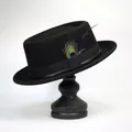 Classic black wool felt fedora hat featuring grosgrain ribbon and a real peacock feather - One Size / Black