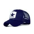 Detail of black trucker hat showing breathable mesh and star patch with text design - Adult 56-60cm Adjustable / Navy Blue