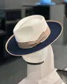 Panama style straw hat in ivory and navy blue weave with a light brown ribbon bow - Light Brown Ribbon Bow Style / Beige & Blue