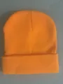 Classic bright orange cuffed knit beanie hat with rib-knit texture for winter warmth - Orange
