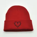 Red winter beanie with black heart embroidery in barbed wire style for a trendy streetwear look - M (56-58cm) / Burgundy