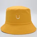 Sombrero de pescador unisex en algodón amarillo con bordado de cara sonriente blanca - M (56-58cm) / Amarillo