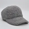 Detailed macro view of dark grey thick sherpa fleece fabric texture on a kids baseball cap - 52-54cm / Gray