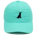Close-up of mint green cotton baseball cap featuring black dog silhouette embroidery - Emerald Green