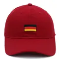 Close-up of German flag embroidery on high-quality red cotton baseball cap front - Burgundy