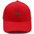 Classic red cotton baseball cap featuring detailed brown horse embroidery on a structured crown - Adult - Adjustable / Red