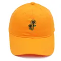 Vibrant orange cotton baseball cap featuring sunflower floral embroidery on the front - Orange