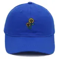 Navy blue cotton baseball cap featuring detailed yellow sunflower floral embroidery - Sapphire Blue