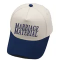 Close-up of Marriage Material embroidery on vintage cotton trucker hat with navy brim - M / Navy Blue
