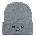 Close-up of gray knit beanie showing detailed texture and embroidered winking smiley face - 54-60cm / Light Heather Grey