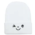White knitted beanie with a black winking smiley face embroidery on the folded cuff - 54-60cm / White