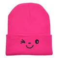 Pink knit beanie for women with a cute black smiley face embroidery on folded cuff - 54-60cm / Rose Red