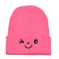Pink knitted beanie hat featuring a black embroidered wink face on a fold-over cuff - 54-60cm / Watermelon red