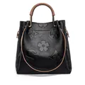 Black embossed bucket bag with brown leather handles and adjustable shoulder strap - Black