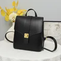Minimalist black leather backpack for women with gold square buckle for commute - Black