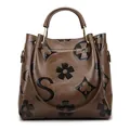 Brown bucket bag with black floral and letter print, textured faux leather finish - Coffee